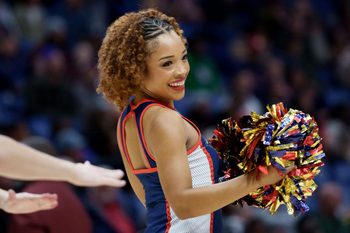 Dec 2, 2025; New Orleans, Louisiana, USA; A member of the New Orleans Pelicans PelSquad dances at Smoothie King Center. Mandatory Credit: Matthew Hinton-Imagn Images