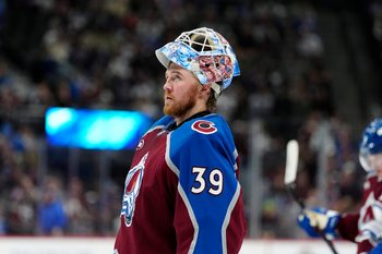 Dec 2, 2025; Denver, Colorado, USA; Colorado Avalanche goaltender Mackenzie Blackwood (39) during at time out in the third period against the Vancouver Canucks at Ball Arena. Mandatory Credit: Ron Chenoy-Imagn Images