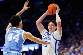 Dec 2, 2025; Lexington, Kentucky, USA; Kentucky Wildcats forward Trent Noah (9) looks to pass the ball during the second half against the North Carolina Tar Heels at Rupp Arena at Central Bank Center. Mandatory Credit: Jordan Prather-Imagn Images