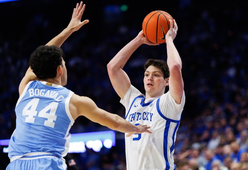 Dec 2, 2025; Lexington, Kentucky, USA; Kentucky Wildcats forward Trent Noah (9) looks to pass the ball during the second half against the North Carolina Tar Heels at Rupp Arena at Central Bank Center. Mandatory Credit: Jordan Prather-Imagn Images