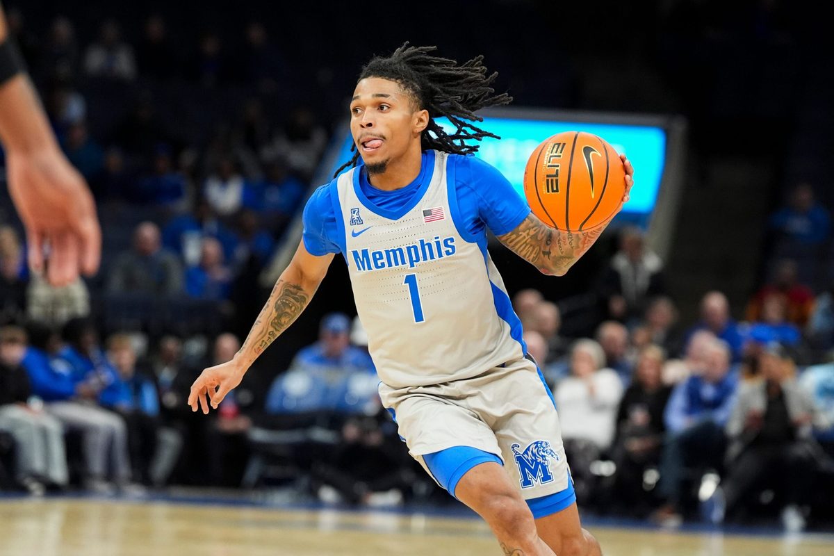 Memphis' Dug McDaniel (1) drives to the basket during the game between the University of New Orleans and the University of Memphis at FedExForum on December 3, 2025.