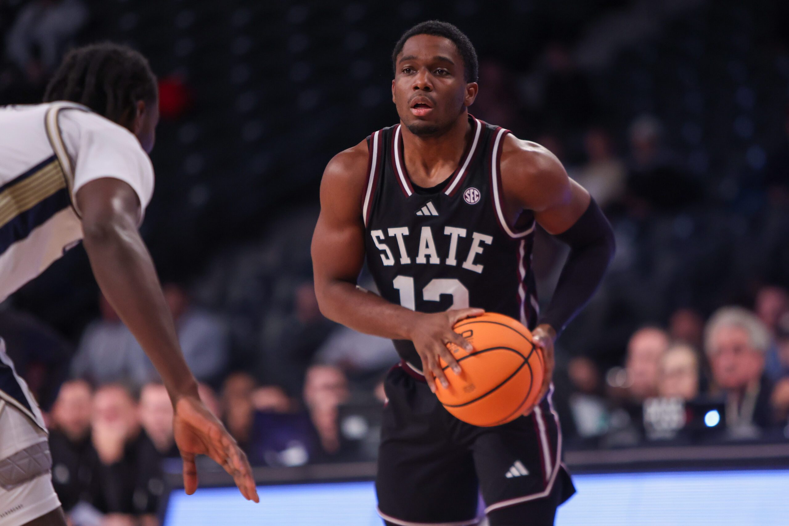 Dec 3, 2025; Atlanta, Georgia, USA; Mississippi State Bulldogs guard Josh Hubbard (12) dribbles against the Georgia Tech Yellow Jackets in the first half at McCamish Pavilion. Mandatory Credit: Brett Davis-Imagn Images