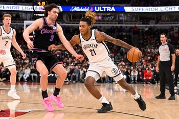 Dec 3, 2025; Chicago, Illinois, USA;  Brooklyn Nets forward Noah Clowney (21) dribbles against Chicago Bulls guard Josh Giddey (3) during the second half at the United Center. Mandatory Credit: Matt Marton-Imagn Images