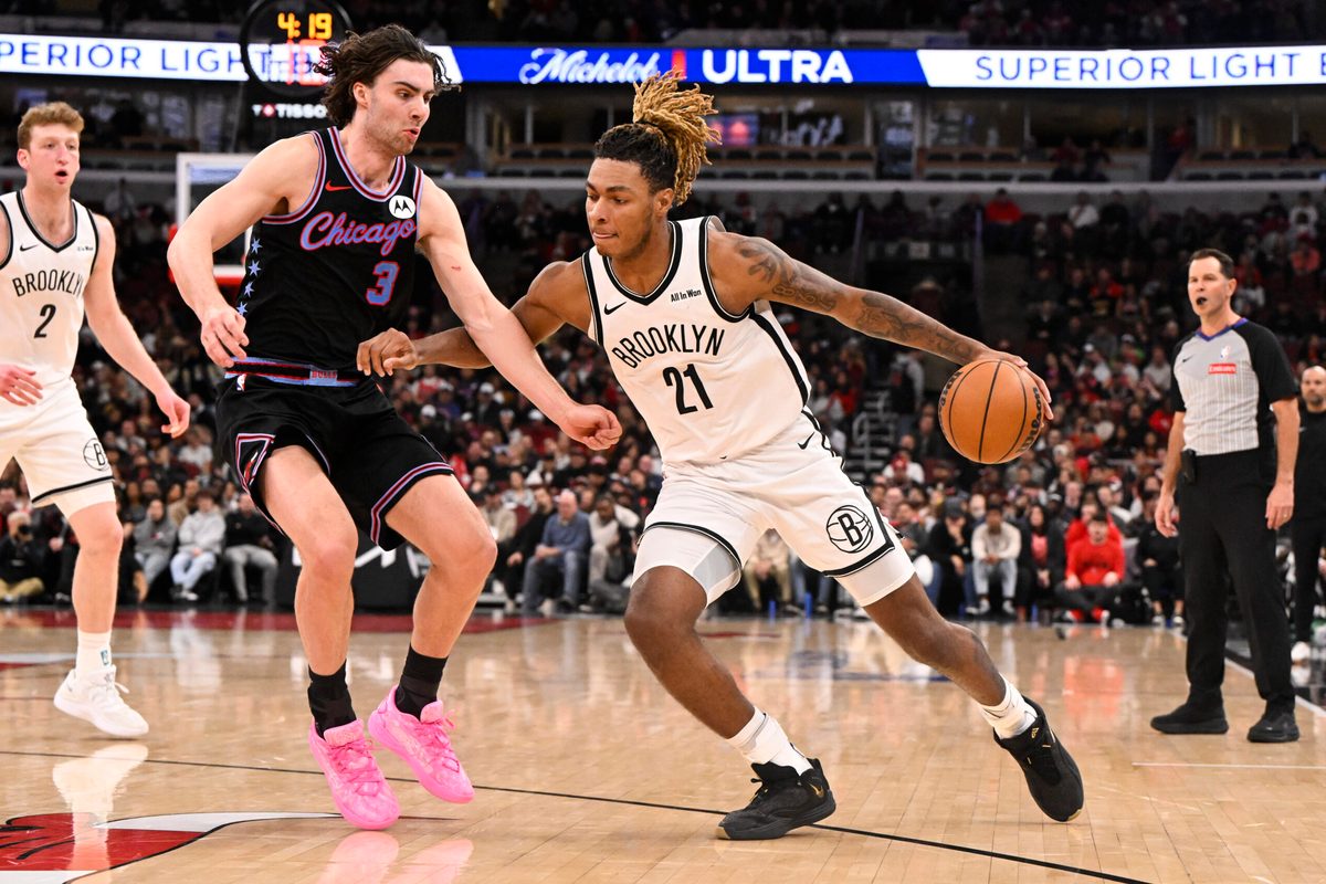 Dec 3, 2025; Chicago, Illinois, USA; Brooklyn Nets forward Noah Clowney (21) dribbles against Chicago Bulls guard Josh Giddey (3) during the second half at the United Center. Mandatory Credit: Matt Marton-Imagn Images