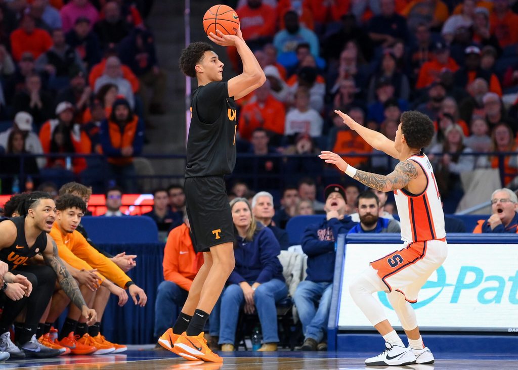 Dec 2, 2025; Syracuse, New York, USA; Tennessee Volunteers forward Nate Ament (10) shoots against Syracuse Orange guard Naithan George (11) during the second half at the JMA Wireless Dome. Mandatory Credit: Rich Barnes-Imagn Images