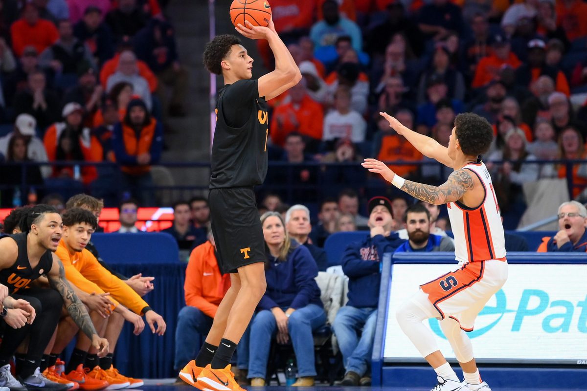 Dec 2, 2025; Syracuse, New York, USA; Tennessee Volunteers forward Nate Ament (10) shoots against Syracuse Orange guard Naithan George (11) during the second half at the JMA Wireless Dome. Mandatory Credit: Rich Barnes-Imagn Images