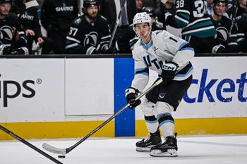 Dec 1, 2025; San Jose, California, USA; Utah Mammoth right wing Dylan Guenther (11) controls the puck against the San Jose Sharks during the first period at SAP Center at San Jose. Mandatory Credit: Justine Willard-Imagn Images