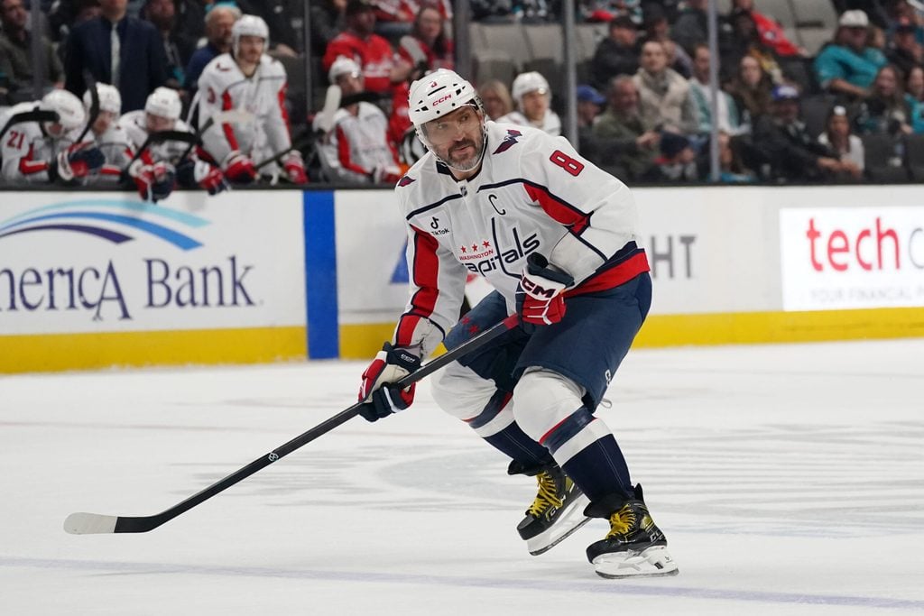Dec 3, 2025; San Jose, California, USA; Washington Capitals left winger Alex Ovechkin (8) waits to receive the puck against the San Jose Sharks in the third period at SAP Center at San Jose. Mandatory Credit: David Gonzales-Imagn Images