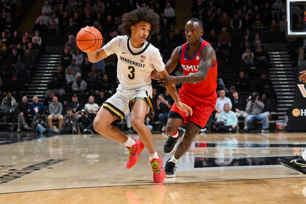 Dec 3, 2025; Nashville, Tennessee, USA; Vanderbilt Commodores guard Tyler Tanner (3) dribbles past Southern Methodist University Mustangs guard Boopie Miller (2) during the first half at Memorial Gymnasium. Mandatory Credit: Steve Roberts-Imagn Images
