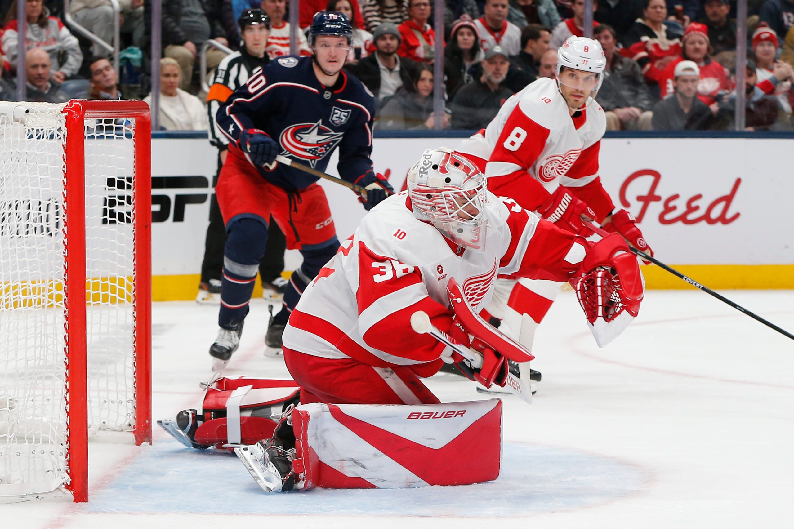 Dec 4, 2025; Columbus, Ohio, USA; Detroit Red Wings goalie Cam Talbot (39) makes a glove save against the Columbus Blue Jackets during the second period at Nationwide Arena. Mandatory Credit: Russell LaBounty-Imagn Images