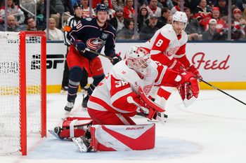 Dec 4, 2025; Columbus, Ohio, USA; Detroit Red Wings goalie Cam Talbot (39) makes a glove save against the Columbus Blue Jackets during the second period at Nationwide Arena. Mandatory Credit: Russell LaBounty-Imagn Images