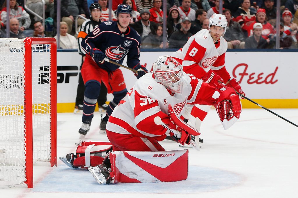 Dec 4, 2025; Columbus, Ohio, USA; Detroit Red Wings goalie Cam Talbot (39) makes a glove save against the Columbus Blue Jackets during the second period at Nationwide Arena. Mandatory Credit: Russell LaBounty-Imagn Images