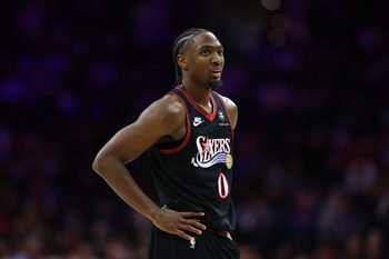 Dec 4, 2025; Philadelphia, Pennsylvania, USA; Philadelphia 76ers guard Tyrese Maxey (0) looks on during the third quarter against the Golden State Warriors at Xfinity Mobile Arena. Mandatory Credit: Bill Streicher-Imagn Images