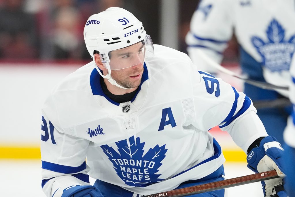 Dec 4, 2025; Raleigh, North Carolina, USA; Toronto Maple Leafs center John Tavares (91) watched the play against the Carolina Hurricanes during the third period at Lenovo Center. Mandatory Credit: James Guillory-Imagn Images