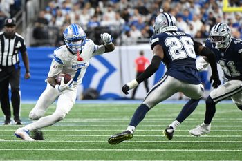Dec 4, 2025; Detroit, Michigan, USA; Detroit Lions wide receiver Jameson Williams (1) runs against Dallas Cowboys cornerback DaRon Bland (26) and defensive end Donovan Ezeiruaku (41) during the second half at Ford Field. Mandatory Credit: Lon Horwedel-Imagn Images