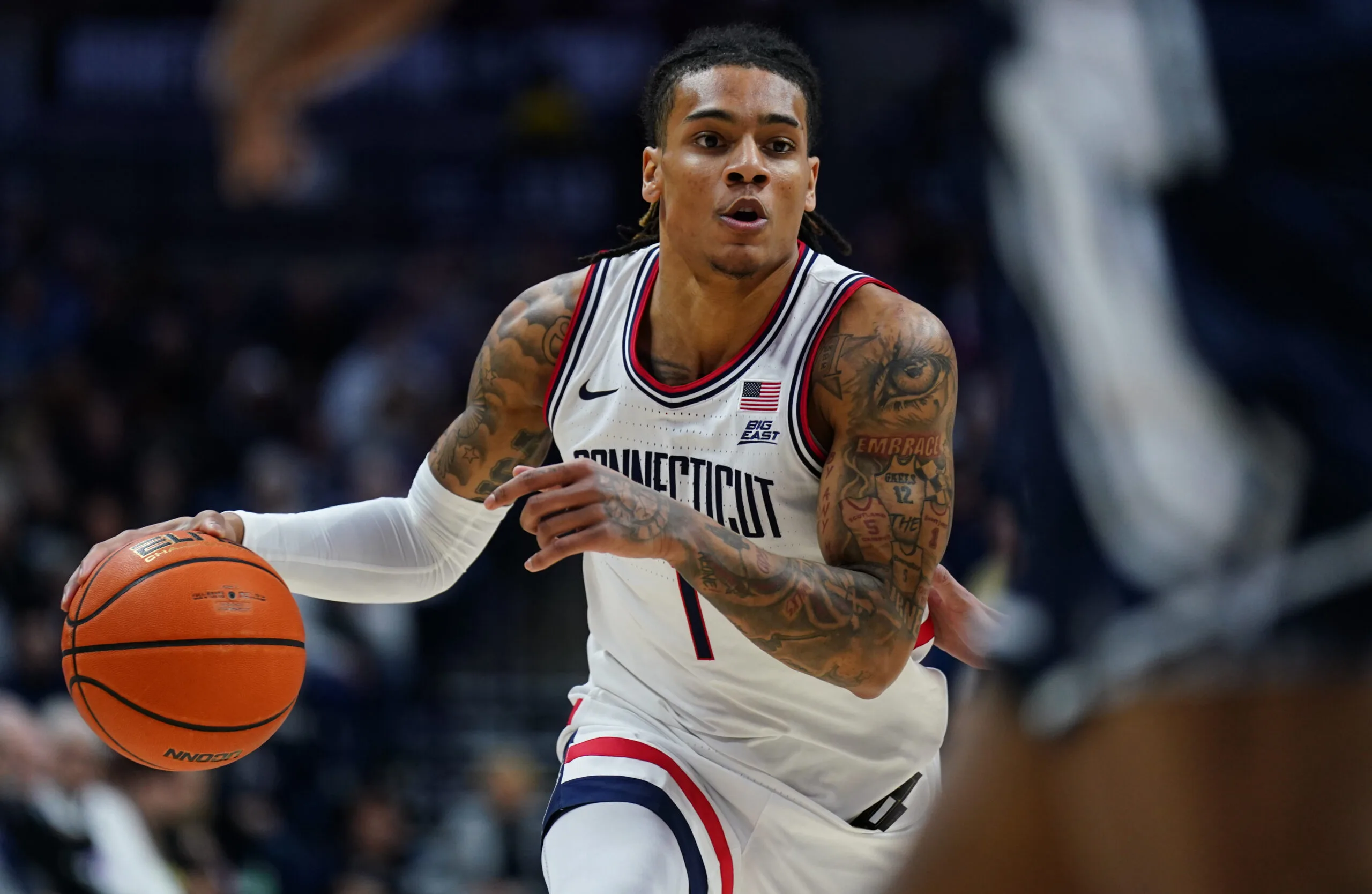 Dec 5, 2025; Storrs, Connecticut, USA; UConn Huskies guard Solo Ball (1) drives the ball against the East Texas A&M Lions in the first half at Harry A. Gampel Pavilion. Mandatory Credit: David Butler II-Imagn Images