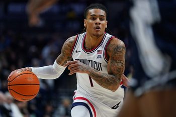 Dec 5, 2025; Storrs, Connecticut, USA; UConn Huskies guard Solo Ball (1) drives the ball against the East Texas A&M Lions in the first half at Harry A. Gampel Pavilion. Mandatory Credit: David Butler II-Imagn Images
