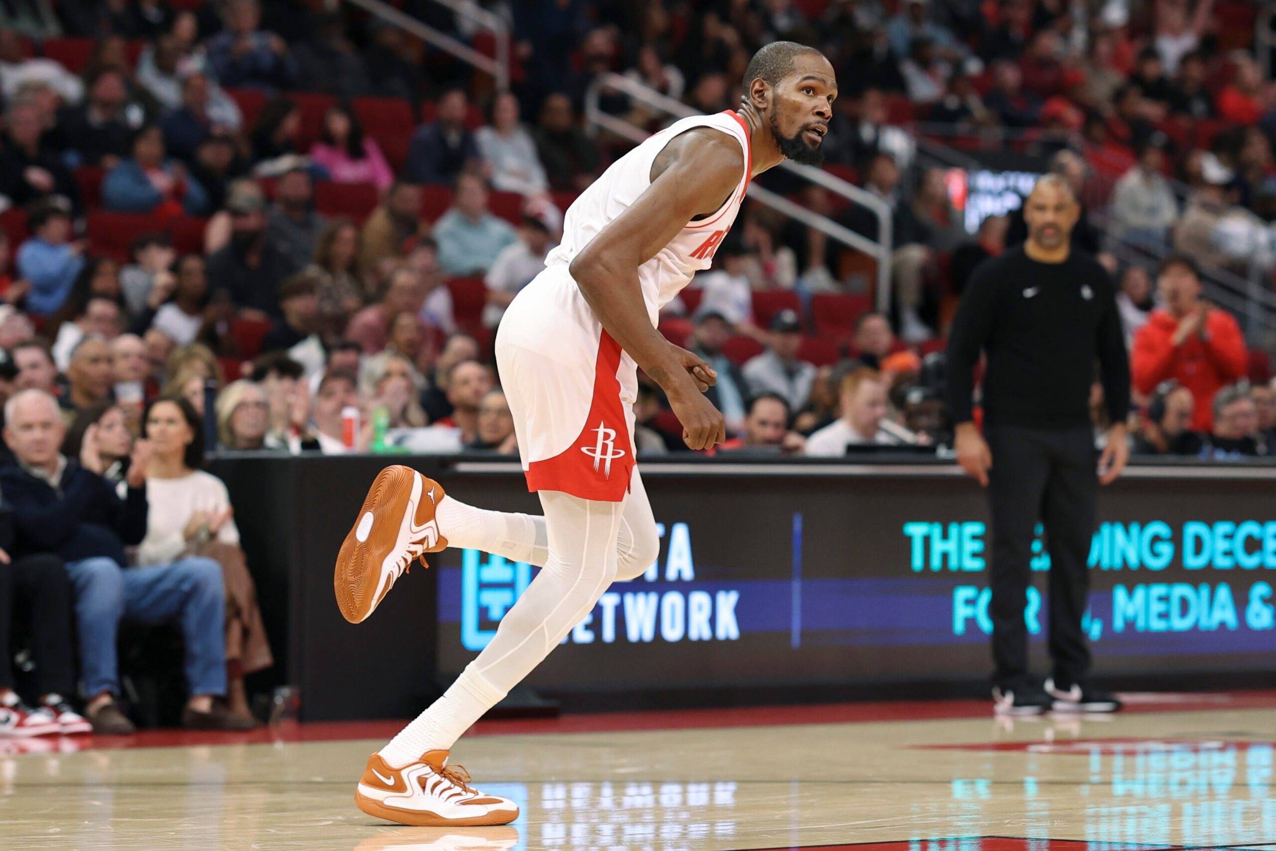 Dec 5, 2025; Houston, Texas, USA; Houston Rockets forward Kevin Durant (7) reacts after scoring a basket during the first half against the Phoenix Suns at Toyota Center. Mandatory Credit: Troy Taormina-Imagn Images