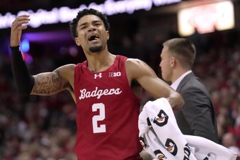 Wisconsin guard Nick Boyd (2) tries to fire up the crowd during the second half of their game Saturday, December 6, 2025 at the Kohl Center in Madison, Wisconsin. Wisconsin beat Marquette 96-76.