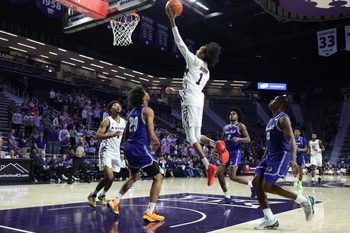 Dec 6, 2025; Manhattan, Kansas, USA; Kansas State Wildcats guard Abdi Bashir Jr. (1) goes to the basket against Seton Hall Pirates guard Mike Williams (29) during the second half at Bramlage Coliseum. Mandatory Credit: Scott Sewell-Imagn Images