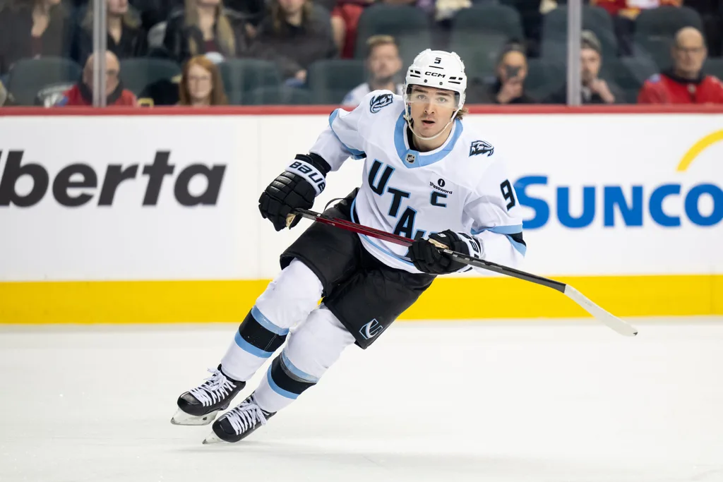 Dec 6, 2025; Calgary, Alberta, CAN; Utah Mammoth right wing Clayton Keller (9) skates against the Calgary Flames during the first period at Scotiabank Saddledome. Mandatory Credit: Brett Holmes-Imagn Images