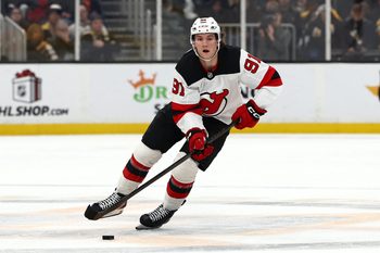 Dec 6, 2025; Boston, Massachusetts, USA; New Jersey Devils center Dawson Mercer (91) carries the puck against the Boston Bruins during the second period at TD Garden. Mandatory Credit: Winslow Townson-Imagn Images