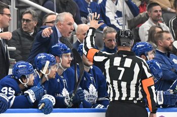 Dec 6, 2025; Toronto, Ontario, CAN;  Toronto Maple Leafs head coach Craig Berube gestures as he speaks to referee Garrett Rank (7) in the first period at Scotiabank Arena. Mandatory Credit: Dan Hamilton-Imagn Images