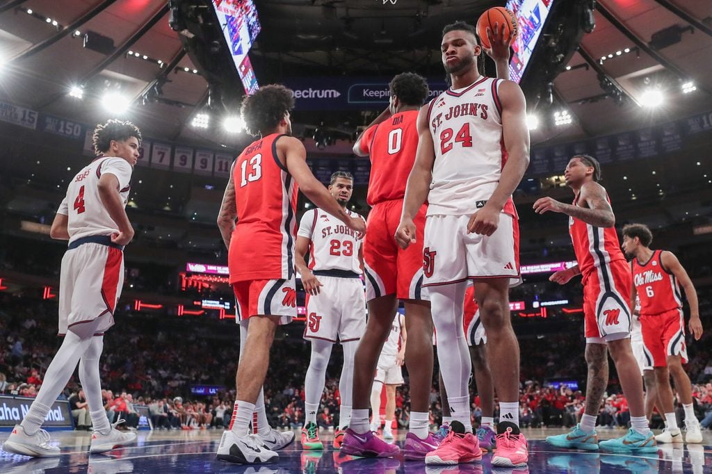 Dec 6, 2025; New York, New York, USA; St. John's Red Storm forward Zuby Ejiofor (24) gestures after getting fouled on a made basket in the second half against the Mississippi Rebels at Madison Square Garden. Mandatory Credit: Wendell Cruz-Imagn Images