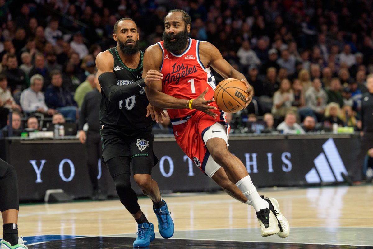Dec 6, 2025; Minneapolis, Minnesota, USA; LA Clippers guard James Harden (1) drives on Minnesota Timberwolves guard Mike Conley (10) in the third quarter at Target Center. Mandatory Credit: Matt Blewett-Imagn Images