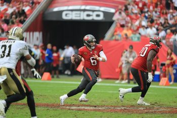 Dec 7, 2025; Tampa, Florida, USA; Tampa Bay Buccaneers quarterback Baker Mayfield (6) runs for a gain during the fourth quarter against the New Orleans Saints at Raymond James Stadium. Mandatory Credit: Kim Klement Neitzel-Imagn Images