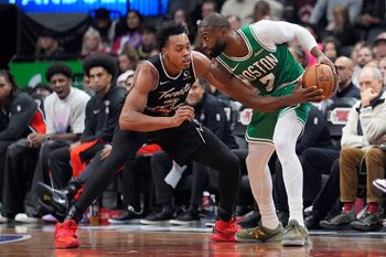 Dec 7, 2025; Toronto, Ontario, CAN; Boston Celtics forward Jaylen Brown (7) controls the ball against Toronto Raptors guard Scottie Barnes (4) during the second half at Scotiabank Arena. Mandatory Credit: John E. Sokolowski-Imagn Images