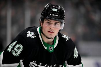 Dec 7, 2025; Dallas, Texas, USA; Dallas Stars center Justin Hryckowian (49) looks on during the second period against the Pittsburgh Penguins at American Airlines Center. Mandatory Credit: Jerome Miron-Imagn Images