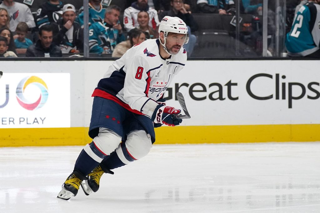 Dec 3, 2025; San Jose, California, USA; Washington Capitals left winger Alex Ovechkin (8) skates toward the puck during a game against the San Jose Sharks in the third period at SAP Center at San Jose. Mandatory Credit: David Gonzales-Imagn Images