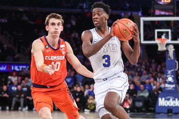 Dec 9, 2025; New York, New York, USA;  BYU Cougars forward AJ Dybantsa (3) drives past Clemson Tigers forward Jake Wahlin (10) in the first half at Madison Square Garden. Mandatory Credit: Wendell Cruz-Imagn Images