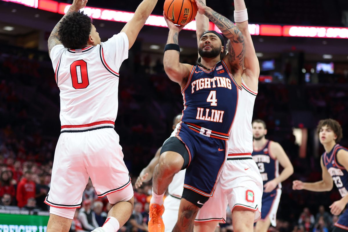 Dec 9, 2025; Columbus, Ohio, USA;  Illinois Fighting Illini guard Kylan Boswell (4) drives to the basket as Ohio State Buckeyes guard John Mobley Jr. (0) defends during the first half Value City Arena. Mandatory Credit: Joseph Maiorana-Imagn Images