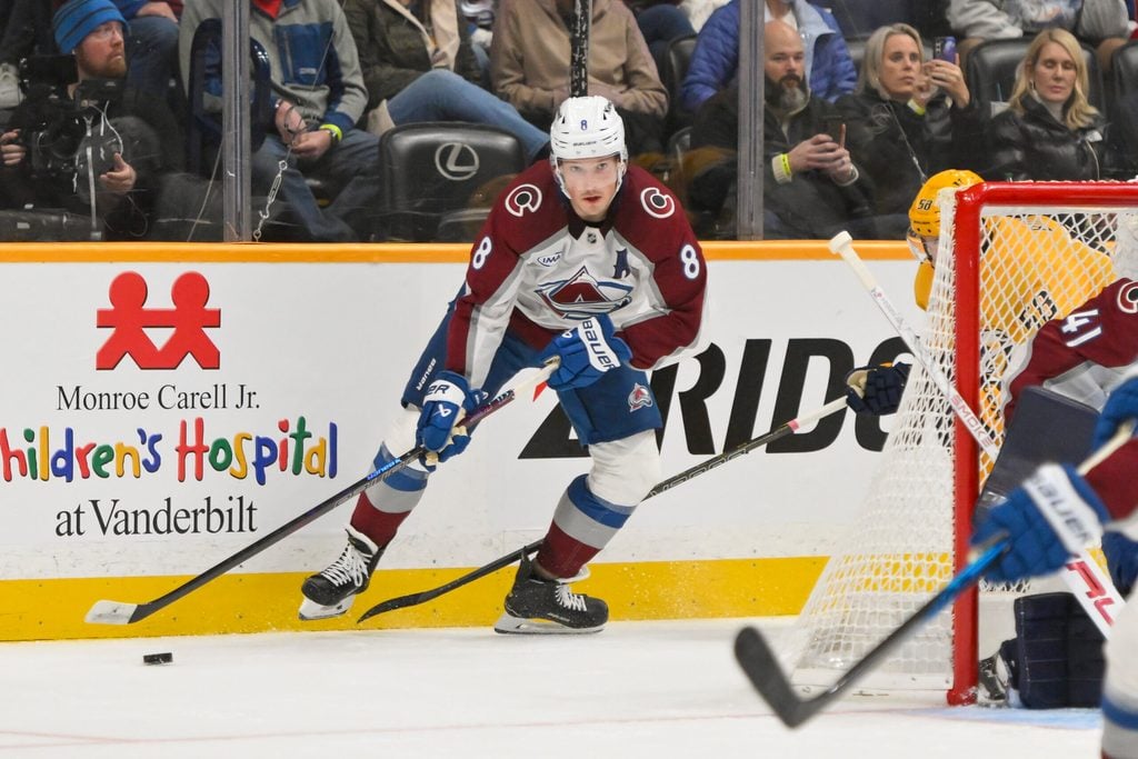 Dec 9, 2025; Nashville, Tennessee, USA; Colorado Avalanche defenseman Cale Makar (8) skates behind the net against the Nashville Predators during the second period at Bridgestone Arena. Mandatory Credit: Steve Roberts-Imagn Images