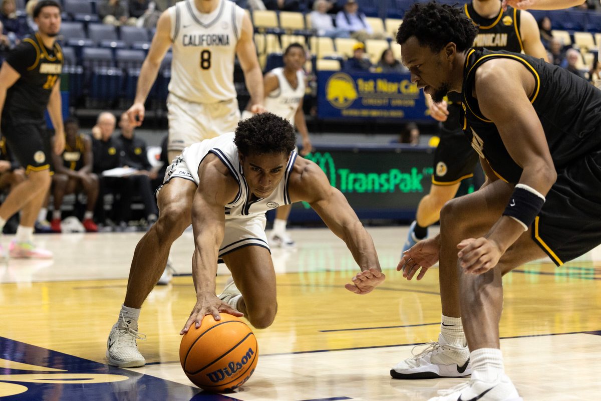 Dec 9, 2025; Berkeley, California, USA; California Golden Bears guard Semetri (TT) Carr (3) and Dominican Penguins forward Sargent Jeffery (22) both vie for the ball during the second half at Haas Pavilion. Mandatory Credit: D. Ross Cameron-Imagn Images