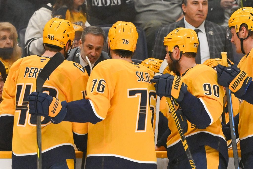 Dec 9, 2025; Nashville, Tennessee, USA; Nashville Predators head coach Andrew Brunette talks with his team during a time out against the Colorado Avalanche during the third period at Bridgestone Arena. Mandatory Credit: Steve Roberts-Imagn Images