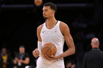Dec 10, 2025; Los Angeles, California, USA;  San Antonio Spurs forward Victor Wembanyama (1) warms up prior to the game against the Los Angeles Lakers at Crypto.com Arena. Mandatory Credit: Jayne Kamin-Oncea-Imagn Images