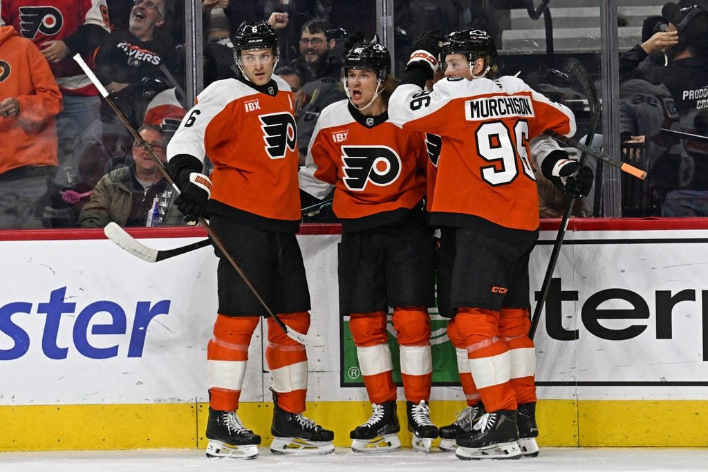 Dec 11, 2025; Philadelphia, Pennsylvania, USA; Philadelphia Flyers center Trevor Zegras (46) celebrates his goal with teammates against the Vegas Golden Knights during the first period at Xfinity Mobile Arena. Mandatory Credit: Eric Hartline-Imagn Images