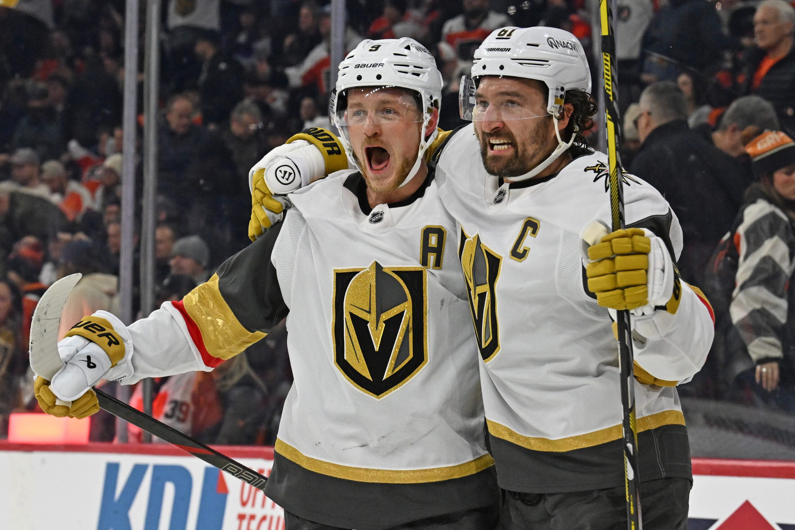 Dec 11, 2025; Philadelphia, Pennsylvania, USA; Vegas Golden Knights right wing Mark Stone (61) celebrates his game winning goal with center Jack Eichel (9) against the Philadelphia Flyers during the overtime period at Xfinity Mobile Arena. Mandatory Credit: Eric Hartline-Imagn Images