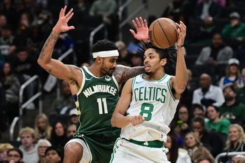 Dec 11, 2025; Milwaukee, Wisconsin, USA; Boston Celtics forward Josh Minott (8) passes the ball away from Milwaukee Bucks guard Gary Harris (11) in the third quarter at Fiserv Forum. Mandatory Credit: Benny Sieu-Imagn Images