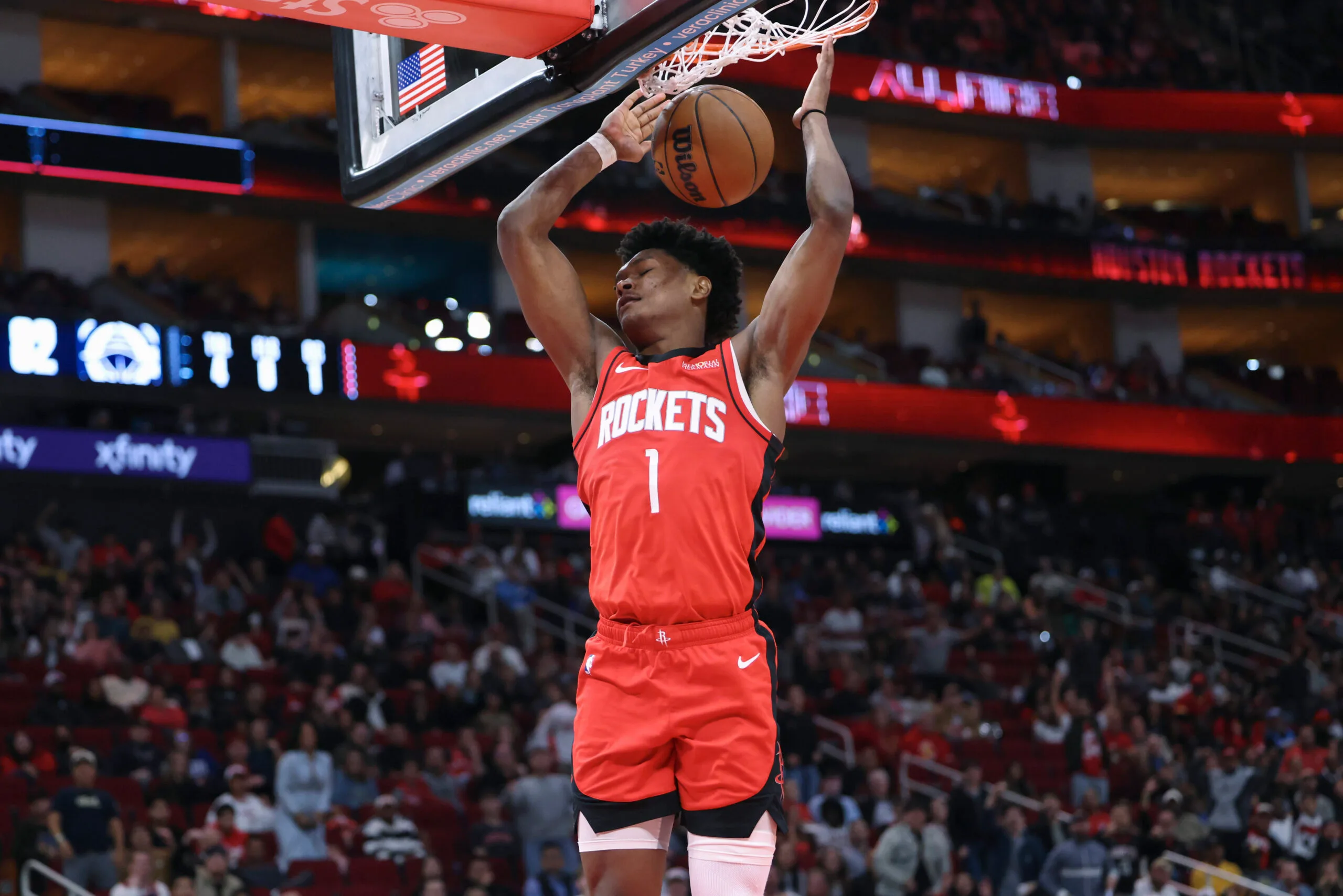 Dec 11, 2025; Houston, Texas, USA; Houston Rockets guard Amen Thompson (1) dunks the ball during the fourth quarter against the Los Angeles Clippers at Toyota Center. Mandatory Credit: Troy Taormina-Imagn Images