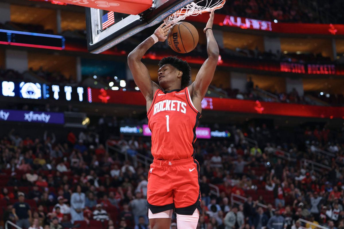 Dec 11, 2025; Houston, Texas, USA; Houston Rockets guard Amen Thompson (1) dunks the ball during the fourth quarter against the Los Angeles Clippers at Toyota Center. Mandatory Credit: Troy Taormina-Imagn Images