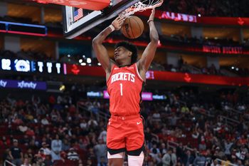 Dec 11, 2025; Houston, Texas, USA; Houston Rockets guard Amen Thompson (1) dunks the ball during the fourth quarter against the Los Angeles Clippers at Toyota Center. Mandatory Credit: Troy Taormina-Imagn Images