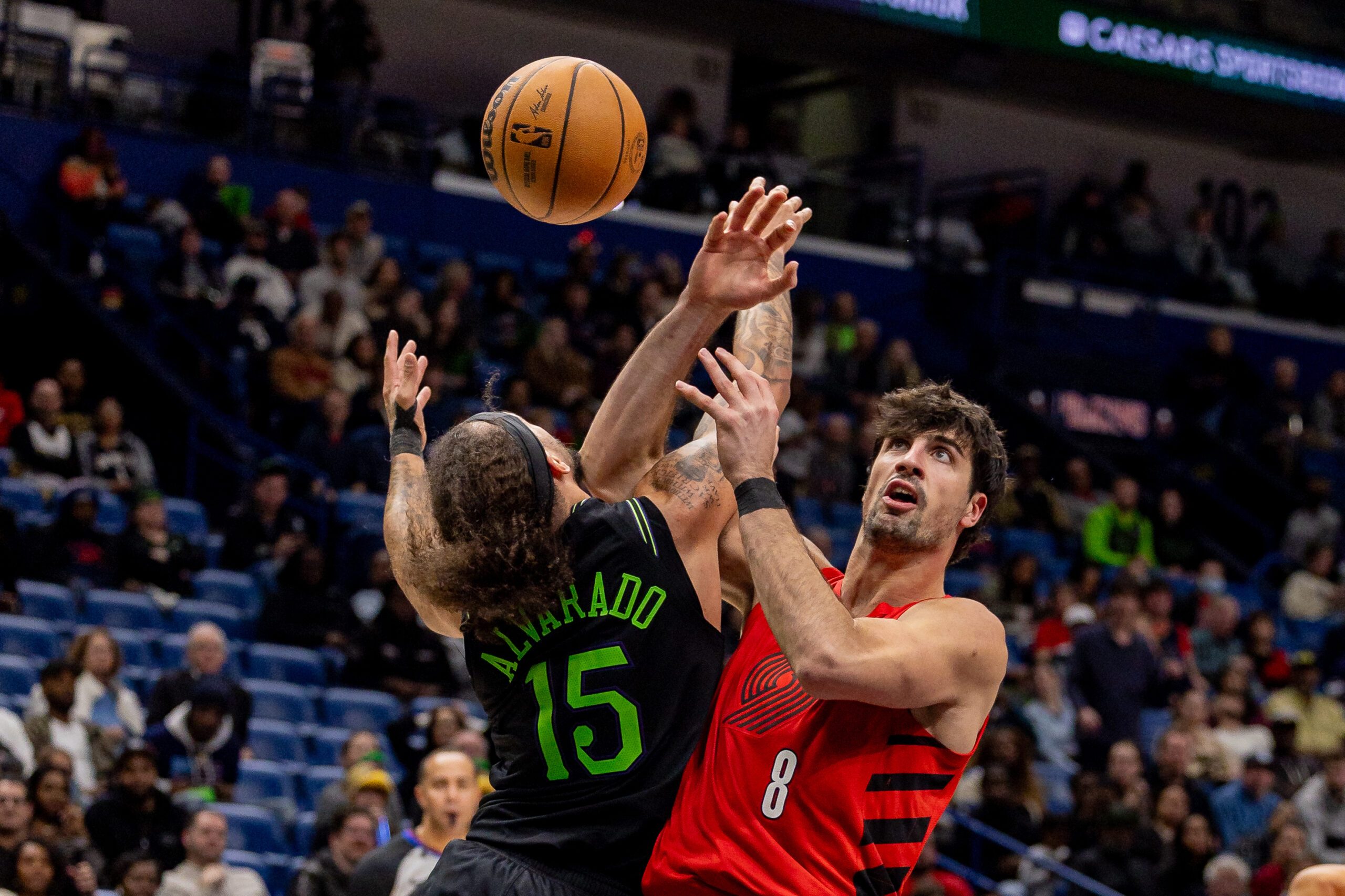 Dec 11, 2025; New Orleans, Louisiana, USA;  Portland Trail Blazers forward Deni Avdija (8) has the ball stolen by New Orleans Pelicans guard Jose Alvarado (15) during the second half at Smoothie King Center. Mandatory Credit: Stephen Lew-Imagn Images