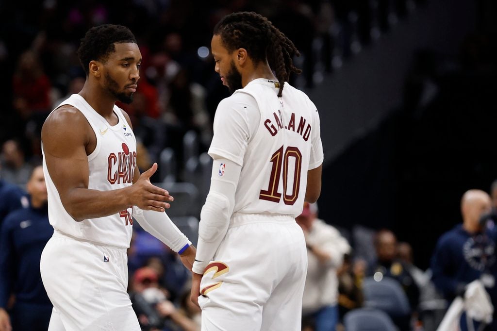Dec 12, 2025; Washington, District of Columbia, USA; Cleveland Cavaliers guard Donovan Mitchell (45) celebrates with Cavaliers guard Darius Garland (10) against the Washington Wizards in the second half at Capital One Arena. Mandatory Credit: Geoff Burke-Imagn Images