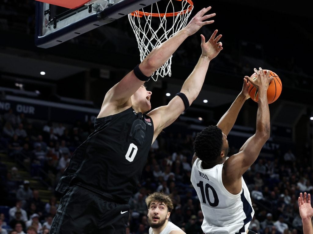 Dec 13, 2025; University Park, Pennsylvania, USA; Penn State Nittany Lions forward Josh Reed (10) grabs the rebound during the second half against the Michigan State Spartans at Bryce Jordan Center. Mandatory Credit: Matthew O'Haren-Imagn Images