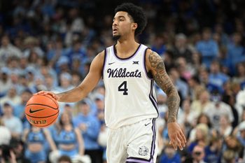 Dec 13, 2025; Omaha, Nebraska, USA;  Kansas State Wildcats guard PJ Haggerty (4) dribbles against the Creighton Bluejays during the first half at CHI Health Center Omaha. Mandatory Credit: Steven Branscombe-Imagn Images