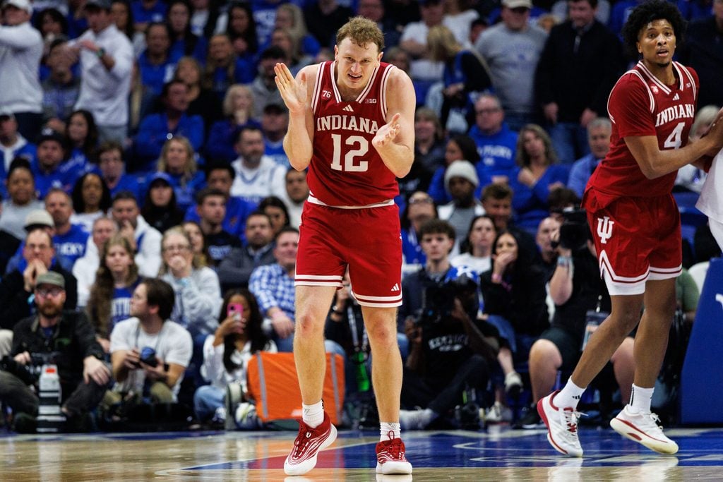 Dec 13, 2025; Lexington, Kentucky, USA; Indiana Hoosiers forward Tucker Devries (12) celebrates a basket during the first half against the Kentucky Wildcats at Rupp Arena at Central Bank Center. Mandatory Credit: Jordan Prather-Imagn Images